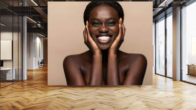 young pretty african american woman naked taking care of her skin isolated on beige background, Healthcare people concept Wall mural